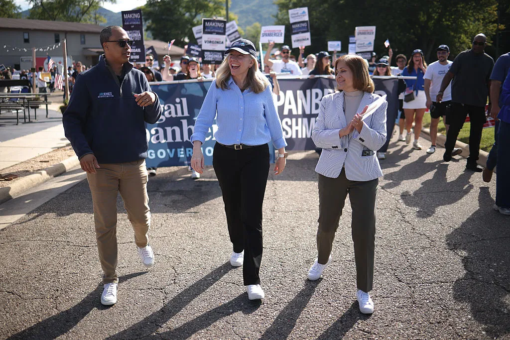 From left, Virginia's Democratic nominee for attorney general Jay Jones, Democratic gubernatorial candidate Abigail Spanberger, and Democratic nominee for lieutenant governor Ghazala Hashmi march in the 54th Annual Buena Vista Labor Day Festival parade.