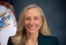 The Governor flexes her muscles